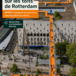 Vue panoramique de la promenade sur les toits de Rotterdam avec des visiteurs en train d'explorer.