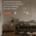 Cuisine en acier inoxydable intégrée dans un vieux bâtiment, alliant modernité et charme ancien.