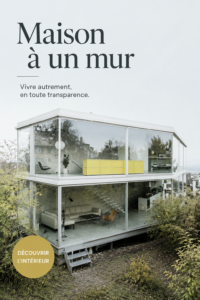 Une belle maison à un mur avec une entrée lumineuse