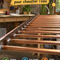 Panneau solaire construit pour chauffer l'eau dans un jardin